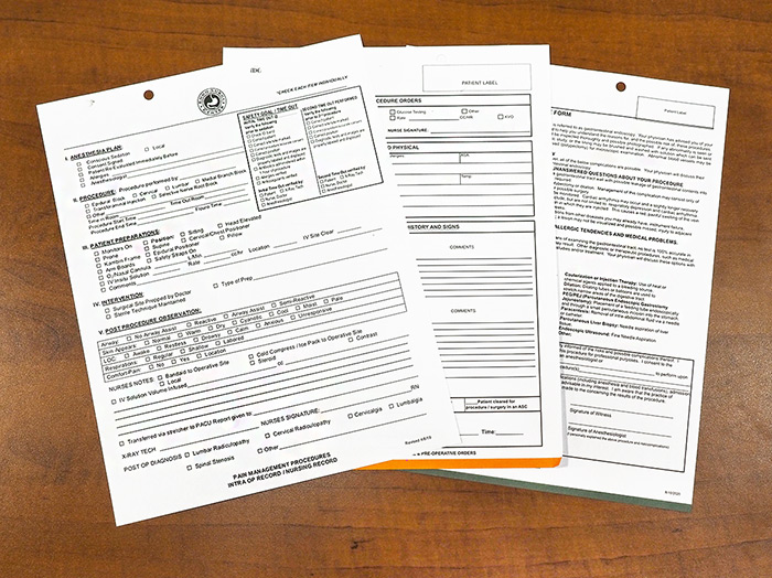 business forms spread out on a table